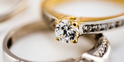 Engagement diamond wedding ring group on white background, golden, diamond rings
